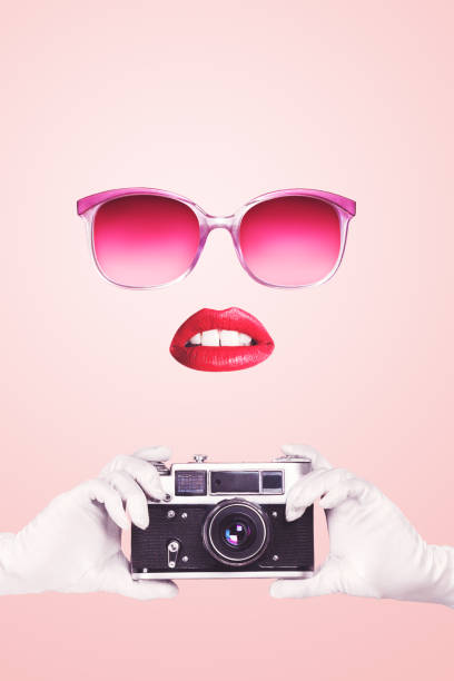 Pop art woman portrait holding vintage film camera Pop art woman portrait holding vintage film camera over pink background pics for classic pin up poses stock pictures, royalty-free photos & images