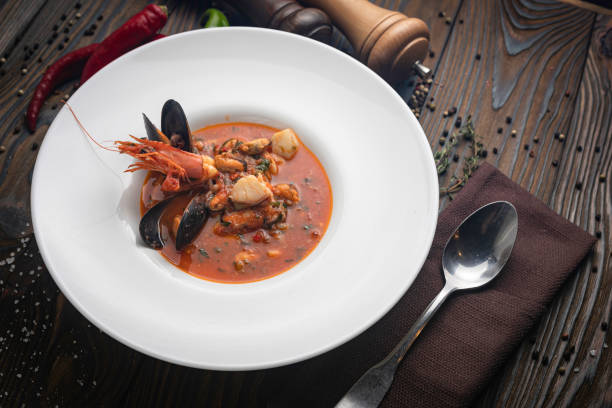 istock Thai tom yam soup with seafood in a white plate 1250231258