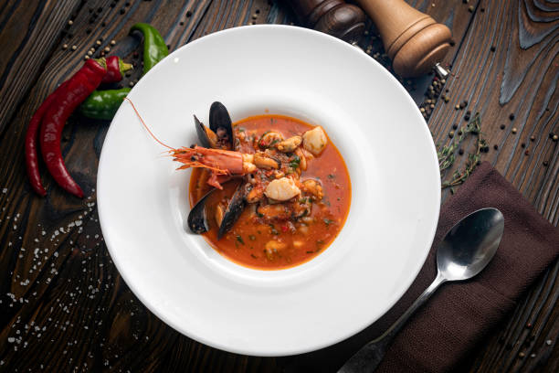 istock Thai tom yam soup with seafood in a white plate 1250231260