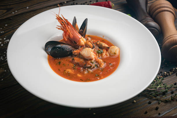 istock Thai tom yam soup with seafood in a white plate 1250231292
