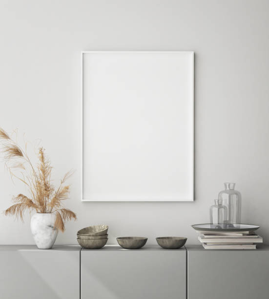 istock mock up poster frame in modern interior background, close up, scandinavian style, 3D render 1250233311