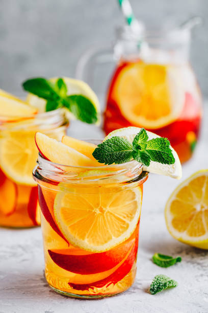 istock Cold peach and lemon iced tea. Summer refreshing drink 1250234332