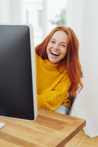 Young woman laughing merrily