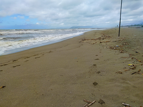sandy beach of versilia empty during the day during the quarantine on the coastline