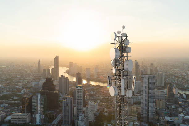 istock Telecommunication tower with 5G cellular network antenna on city background 1250239091