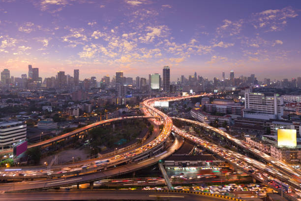 istock Cityscape and highway traffic motion at twilight scene 1250239155