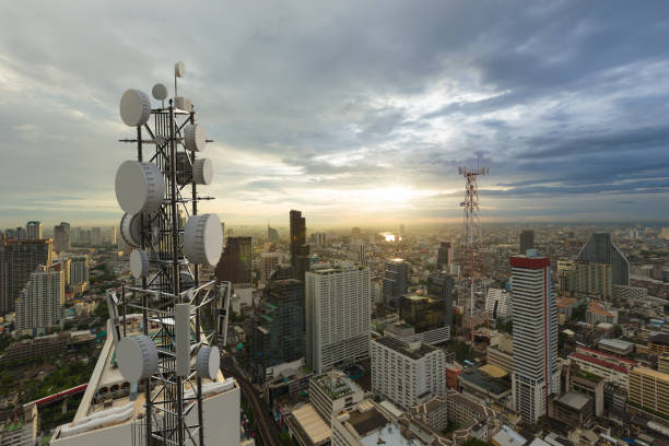 istock Telecommunication tower with 5G cellular network antenna on city background 1250239228