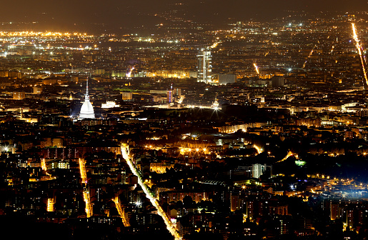 night view of Turin city in Northern Italy and the famous landmark called Mole Antonelliana