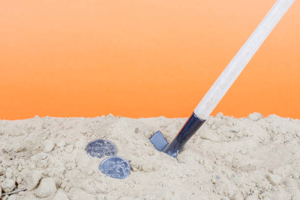 istock a shovel is stuck in the ground, and next two rubles 1250241990