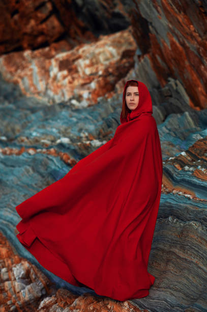 istock Fairytale woman wearing red cape 1250242789