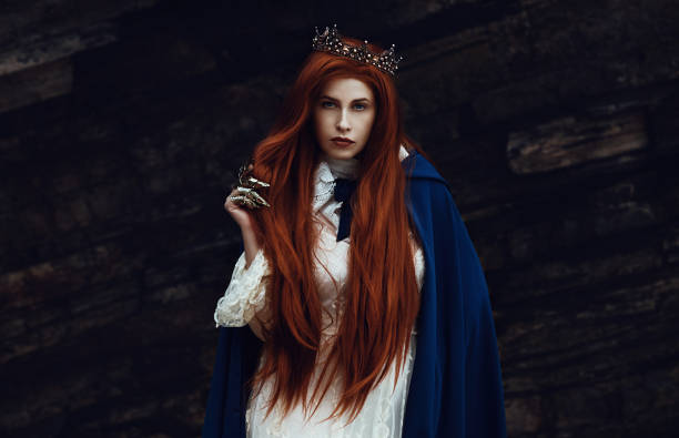 istock The queen posing with her crown 1250242800