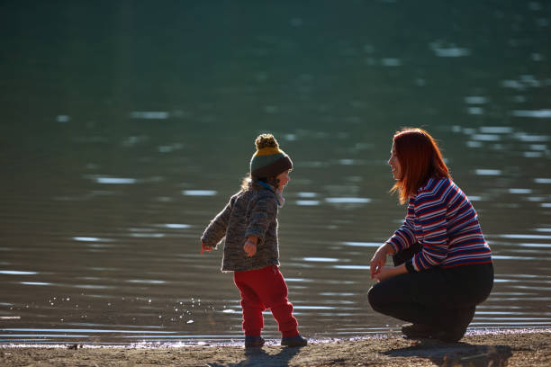 istock Talking and feeling happy at the lake 1250244416