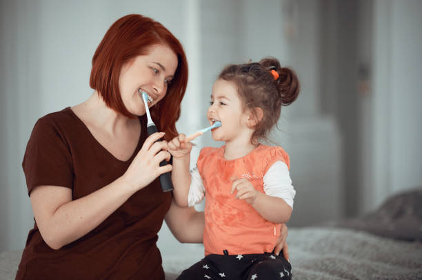 happiness starts in the morning with brushing our teeth - hairstyle crest imagens e fotografias de stock