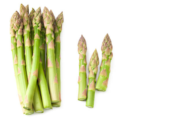 istock Fresh green asparagus isolated on white background 1250245007