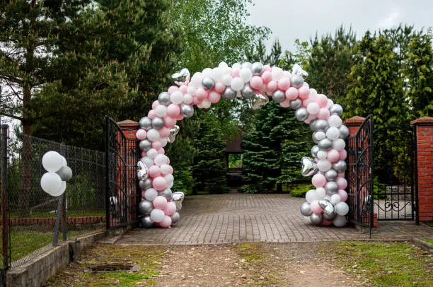 Photo of Wedding arch made of colorfull inflatable balloons