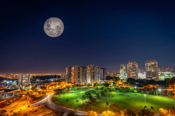 Super Moon shining at Ribeirão Preto city at night Super Moon shining at Ribeirão Preto city at night ribeirão preto photos stock pictures, royalty-free photos & images