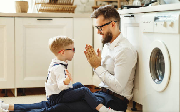 istock happy father and son hug at home 1250248650