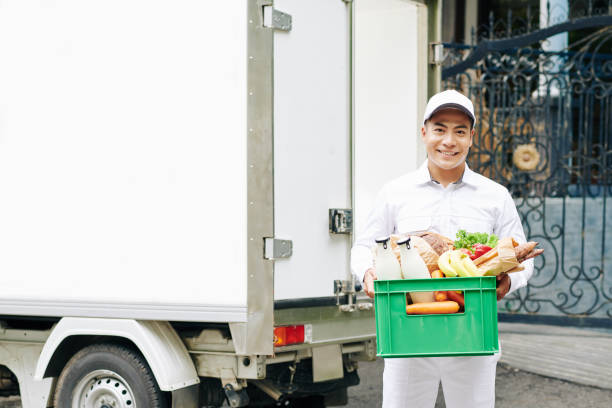 istock Cheerful Food Delivery Man 1250251286