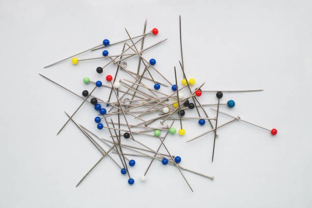 Many multi-coloured sewing pins stock photo