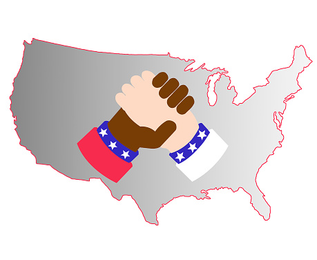 Handshake. Hands of white and black race. Isolated on the contour map of the United States.