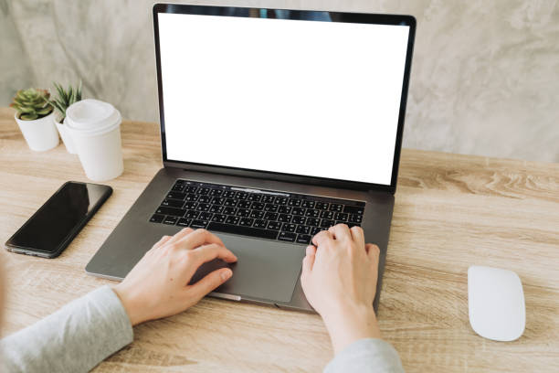 istock woman using laptop and working on wooden table 1250261227