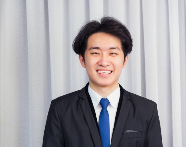 istock Business man laughing confident mature standing in suit smiling 1250262529