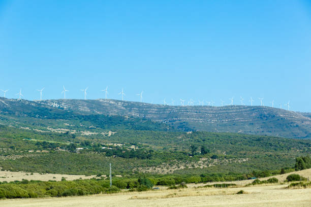 istock Picturesque valley with a windmill in the Mediterranean 1250262601