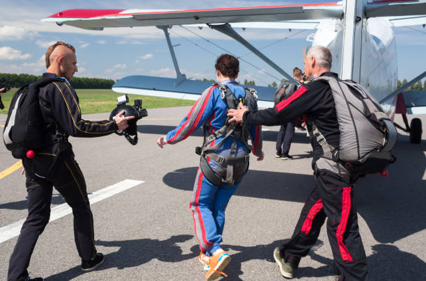 istock Commercial skydiving with instructor and videographer. 1250263561