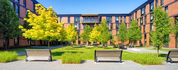 istock Panoramic view of a modern Montreal apartment complex with a landscaped courtyard 1250269878