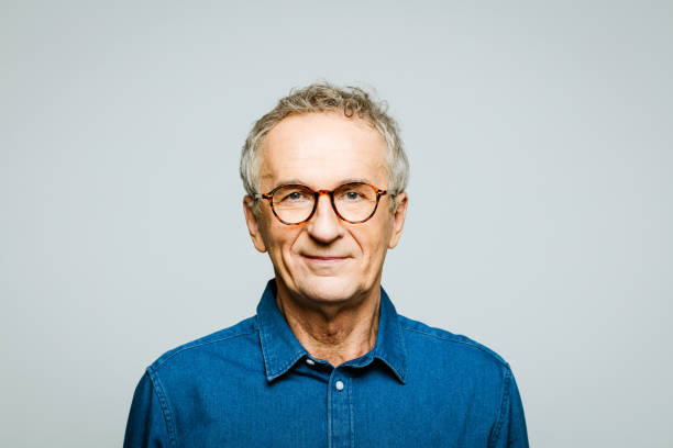 istock Headshot of friendly senior man 1250270826