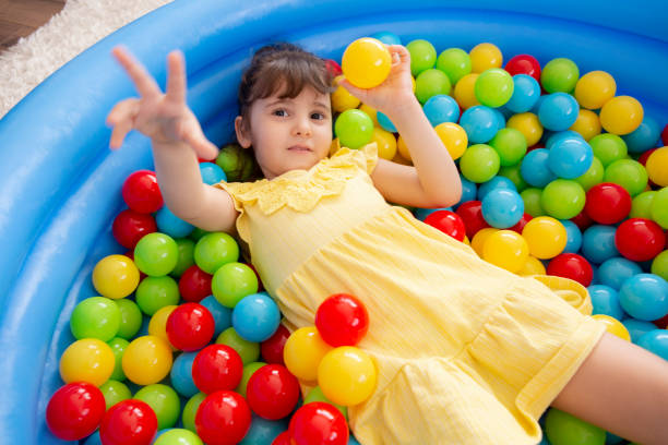 istock Little girl playing 1250273284