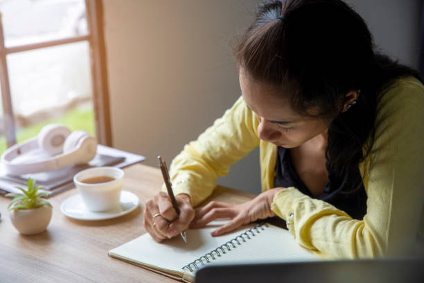 istock Planner write meeting agenda at Calendar 1250274524