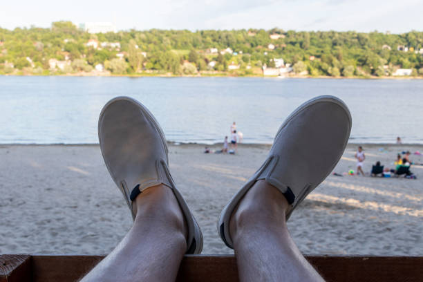Legs in shoes on holiday