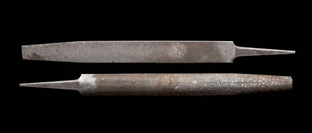 istock Old Soviet Rusty Rough File Rasp Tool Instrument Isolated on Black Background 1250281607
