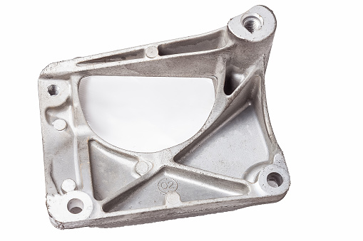 Aluminum bracket - a supporting part or structure used to mount car elements on a white isolated background in a photo studio. Spare parts for replacement or sale in a car service.