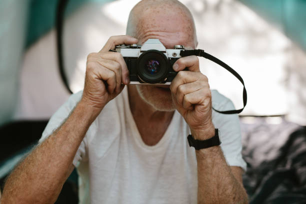 istock Capturing the landscape in his camera 1250289074