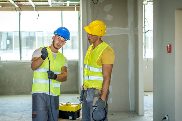 istock Electrician making wiring at new house 1250290307