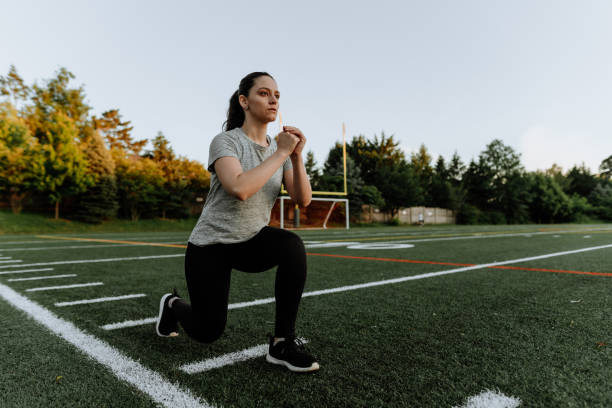 istock Woman Exercising in School Field 1250290655