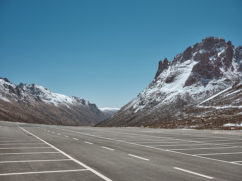 An empty parking lot in the mountains