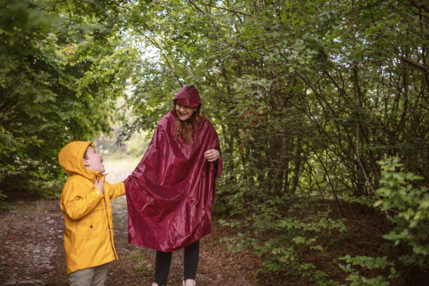 istock Family walking together on a rainy day 1250297300