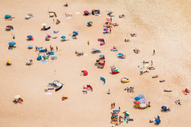 istock Panoramic view of ocean sand beach drone view. 1250299731