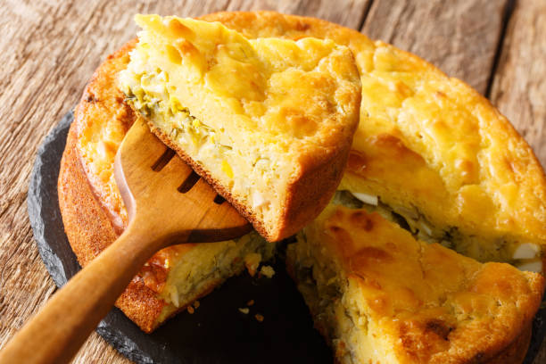 istock Baked cabbage pie with herbs and boiled eggs close-up. horizontal 1250299836