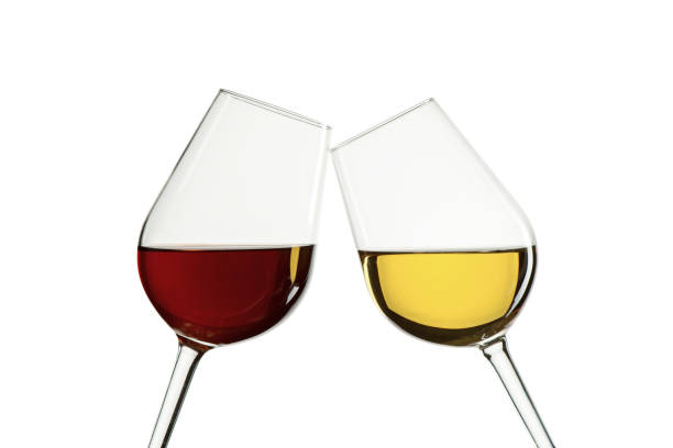istock Two glasses with red and white wine on white isilated background 1250299970