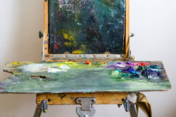 istock The box easel with oil paints, palette 1250300820
