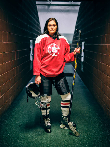 istock Woman Hockey Player 1250302727