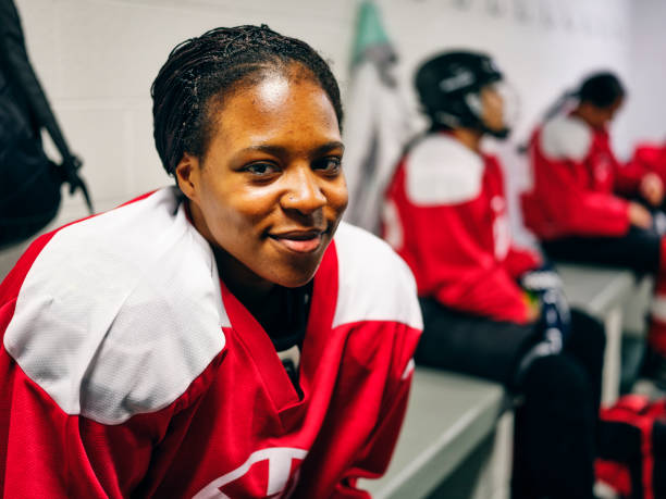 Women's Hockey Team in a Locker Room