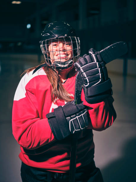 istock Woman Hockey Player on the Ice 1250303656