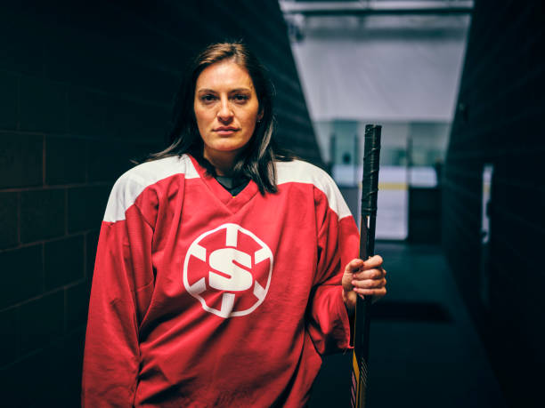 istock Woman Hockey Player 1250303875