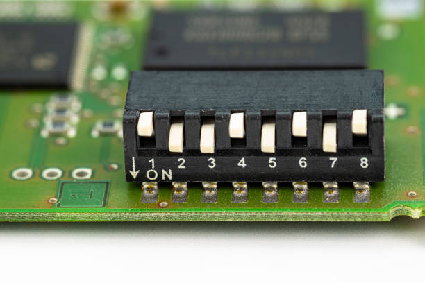 istock Analog switch on a green printed circuit board with eight positions, adjustable up and down. 1250303935