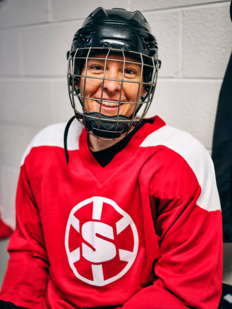 istock Women's Hockey Team in a Locker Room 1250304665